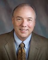 Professional headshot of Michael Rogers.