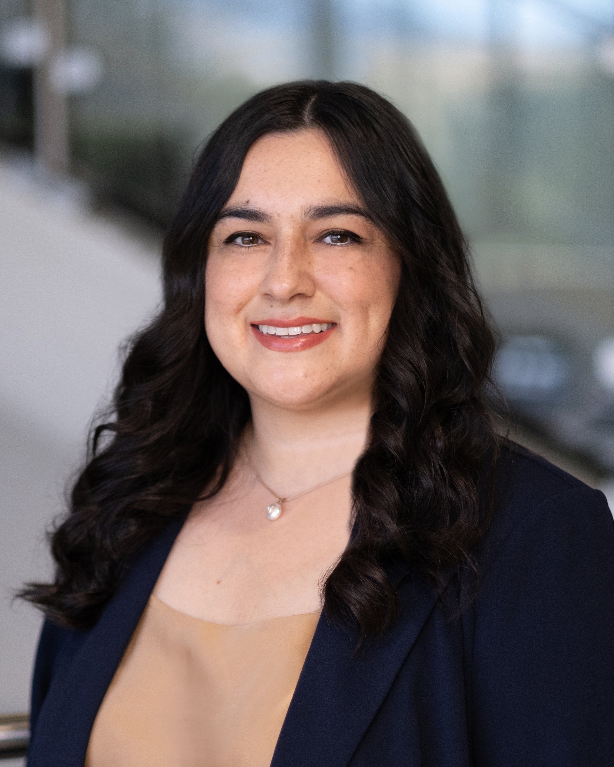 Professional headshot of Beatriz Mejia.