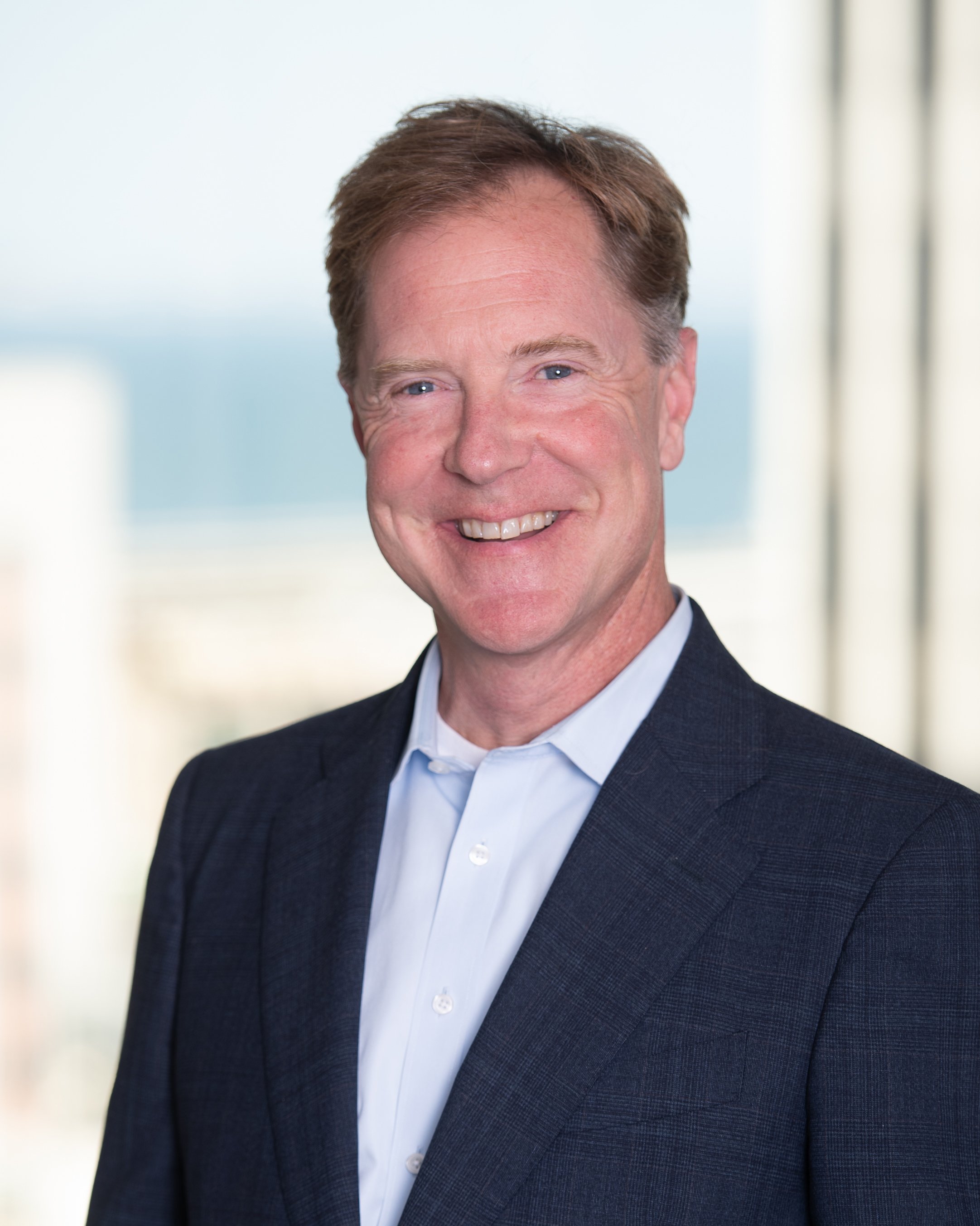 Professional headshot of James Hauer.