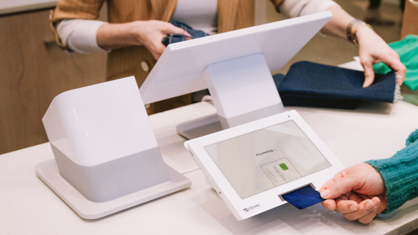 paying by card using Clover Station Duo device